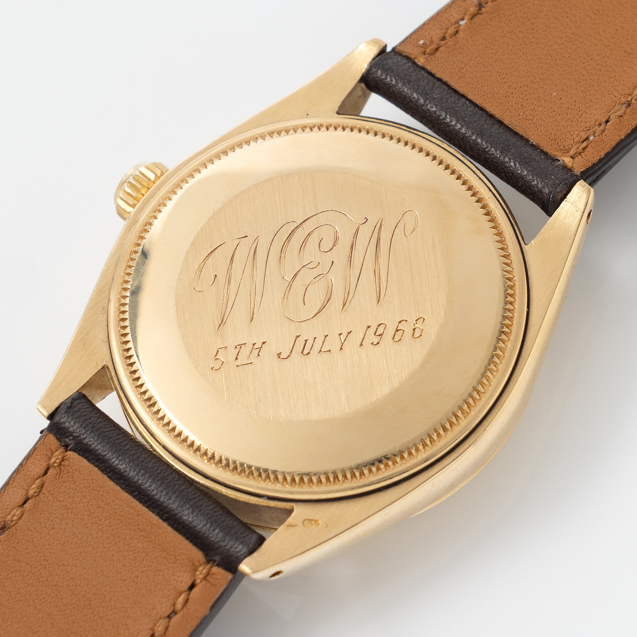 Rolex Oyster Perpetual Vertical brushed Champagne Dial in 18 k Yellow Gold ref 1002