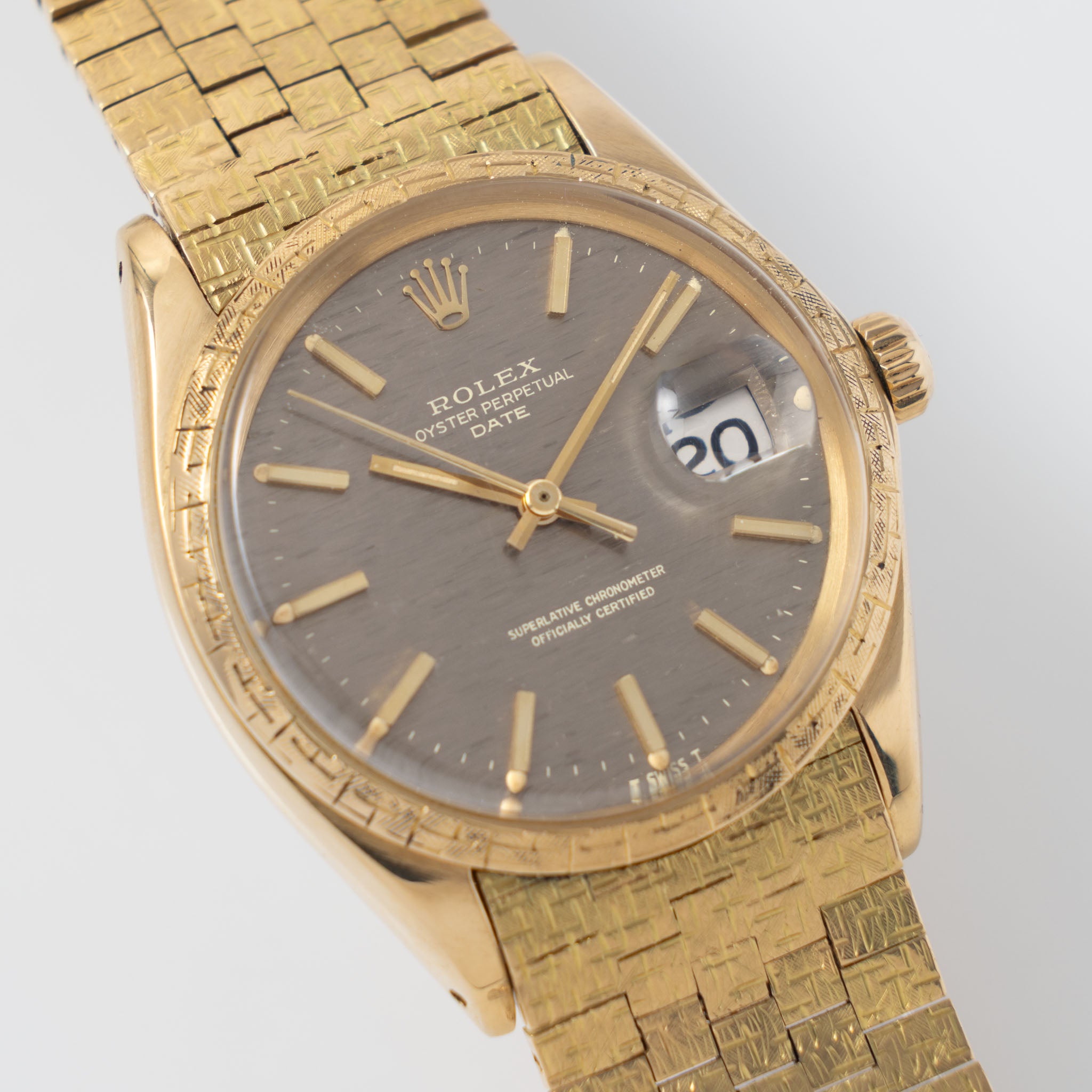 Rolex Oyster Perpetual Date grey brick dial Moreau finish with brick bracelet ref 1504 in 18 k yellow gold