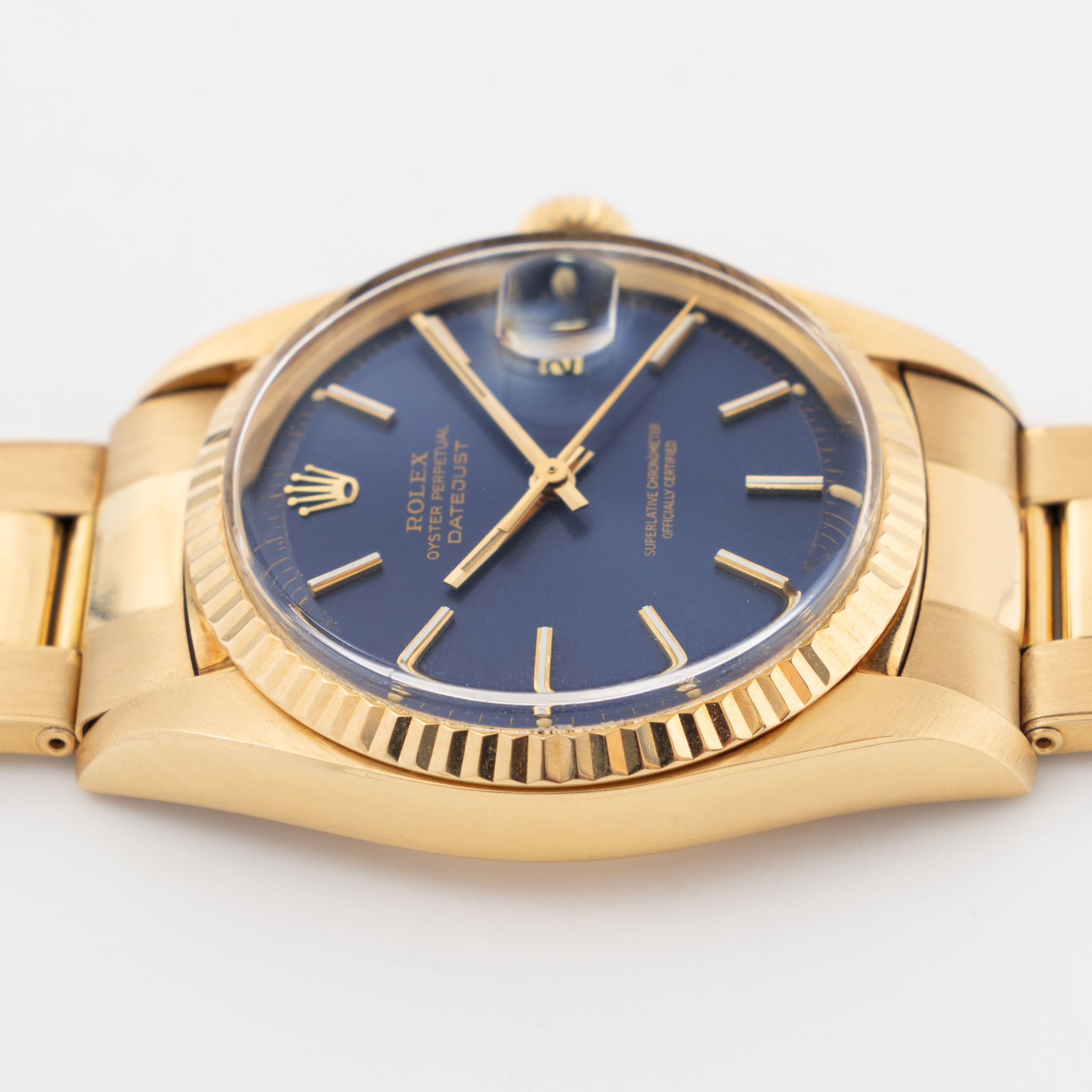 Rolex Datejust 1601/8 Blue Soleil Dial in 18k Yellow Gold with Original Papers