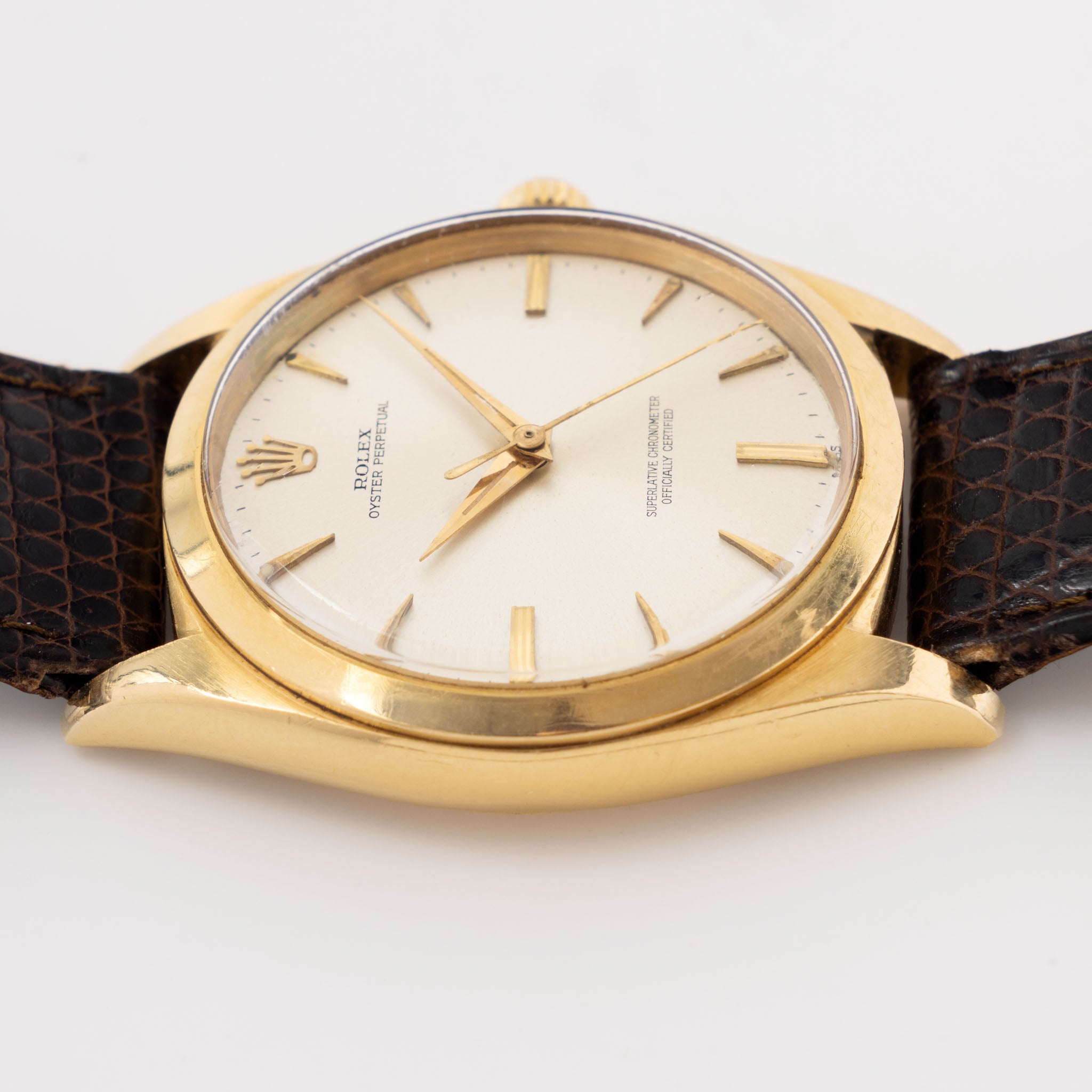 Rolex Oversized Oyster-Perpetual 1012 Silver Swiss Only Dial in 18k Yellow Gold