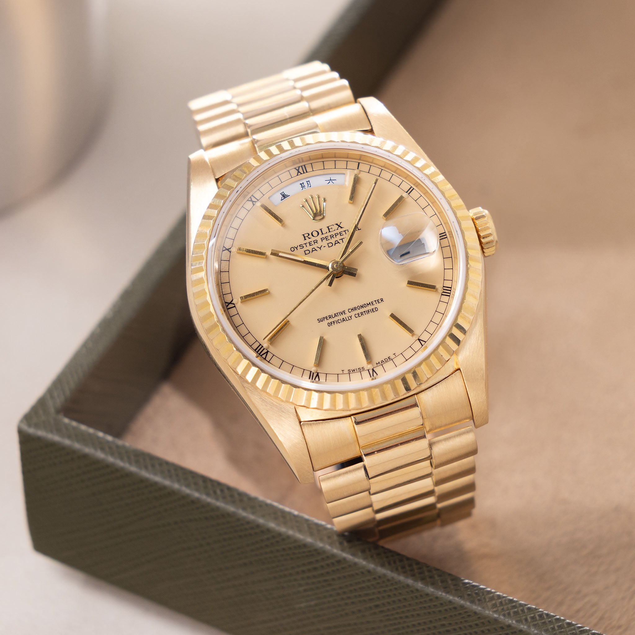 Rolex Day-Date 18238 rare Apricot Stella Dial with Original Guarantee paper in 18k yellow