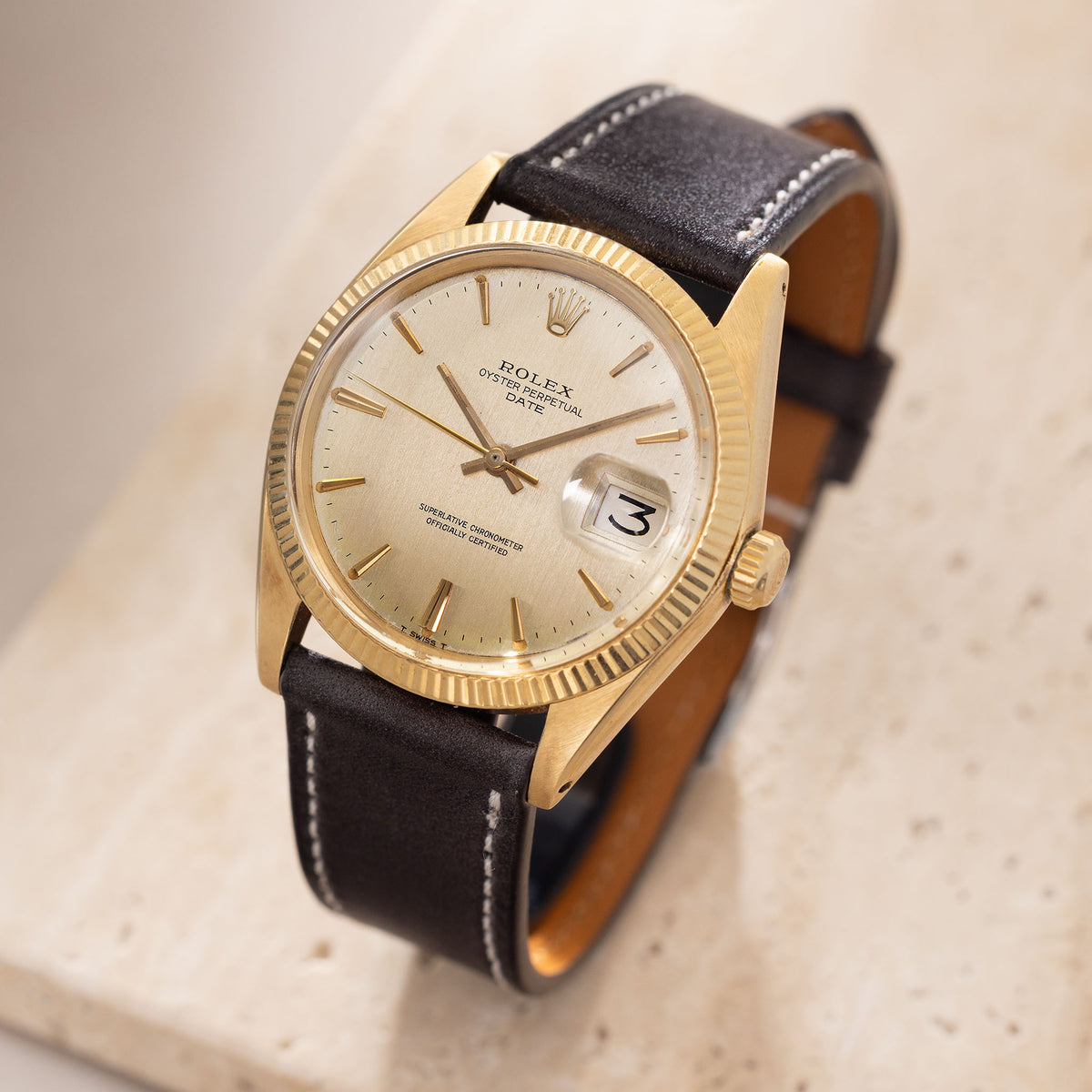 Rolex Oyster Perpetual Date 1503 in 18k Yellow Gold Vertical Brushed Champagne Dial