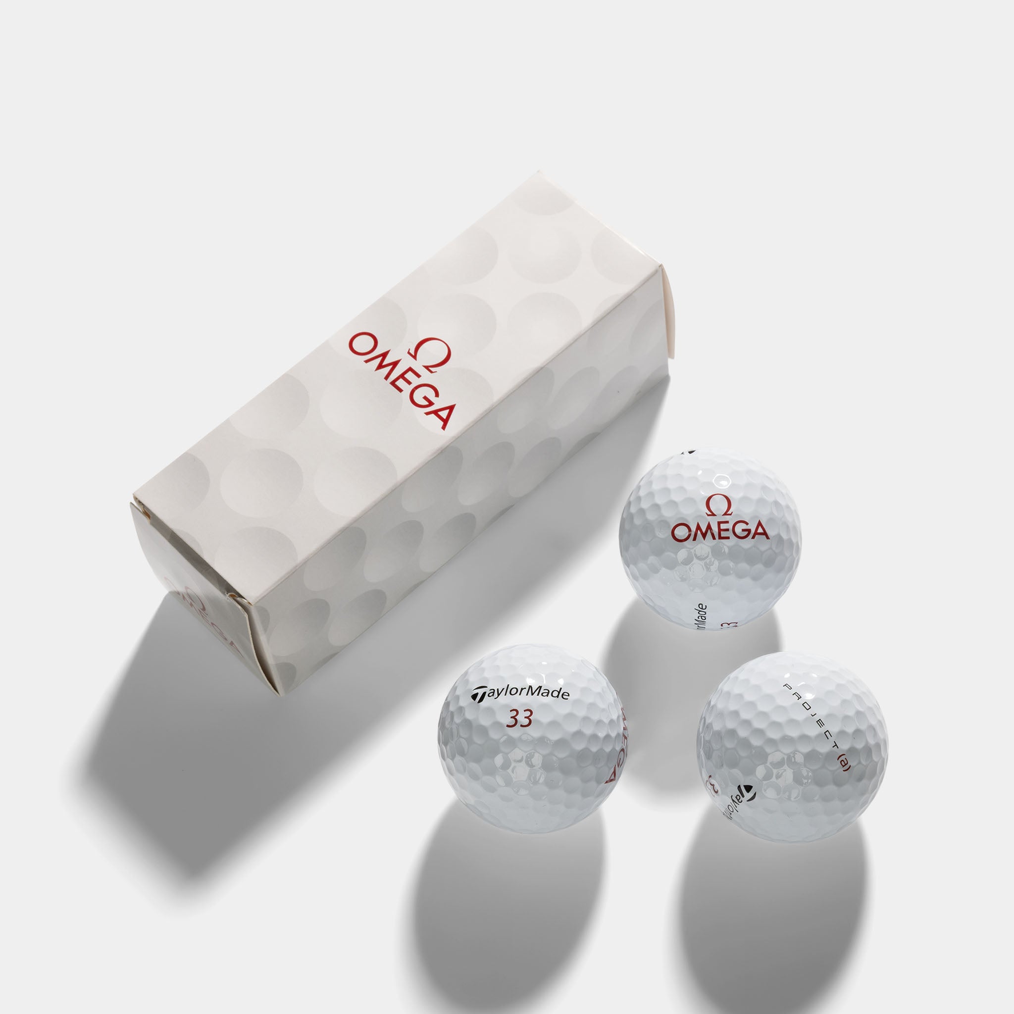 Omega set of three collectable golfballs