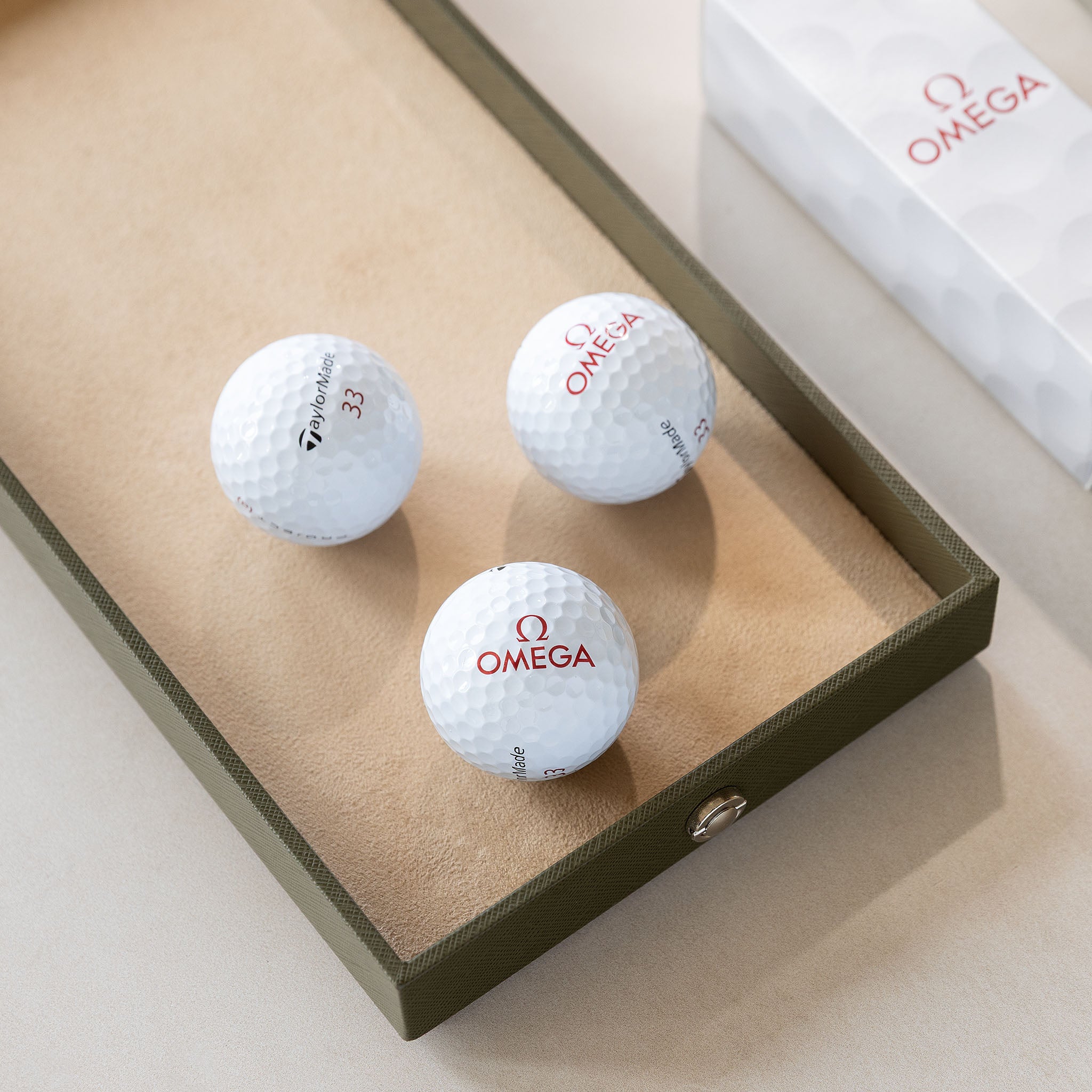 Omega set of three collectable golfballs
