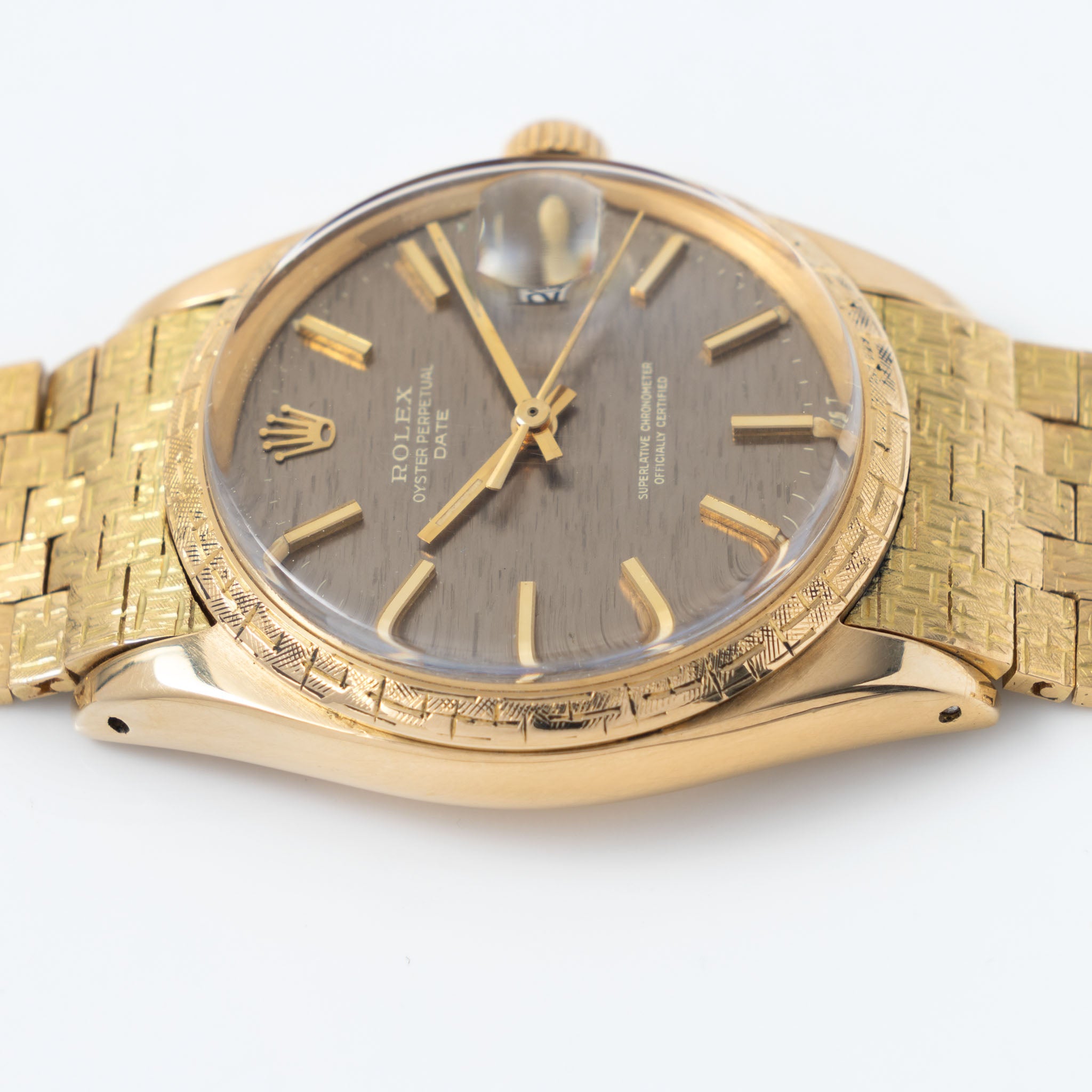 Rolex Oyster Perpetual Date grey brick dial Moreau finish with brick bracelet ref 1504 in 18 k yellow gold