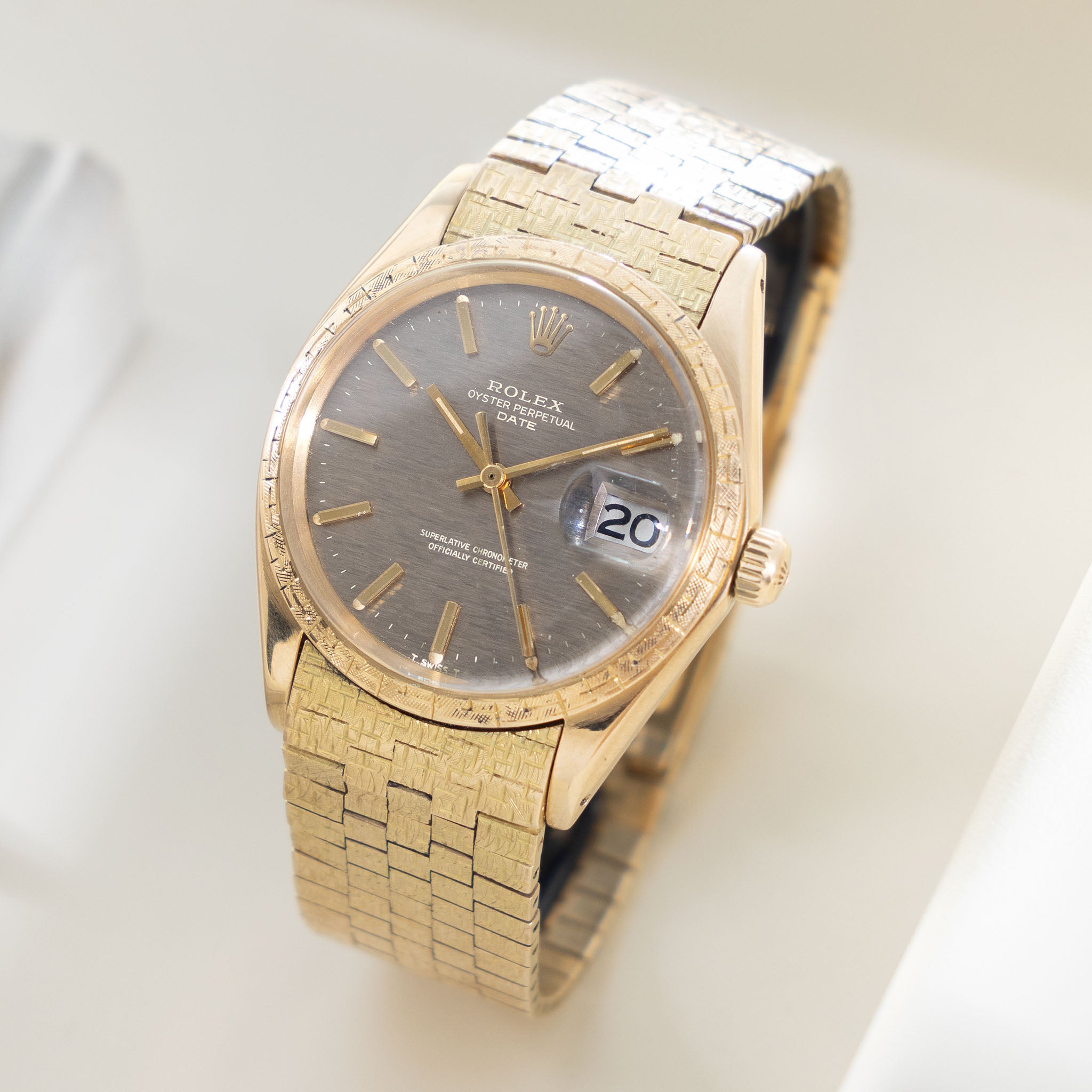 Rolex Oyster Perpetual Date grey brick dial Moreau finish with brick bracelet ref 1504 in 18 k yellow gold