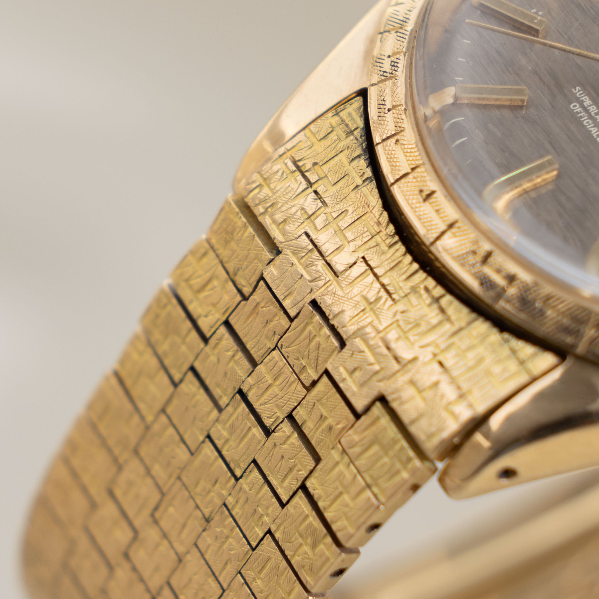 Rolex Oyster Perpetual Date grey brick dial Moreau finish with brick bracelet ref 1504 in 18 k yellow gold