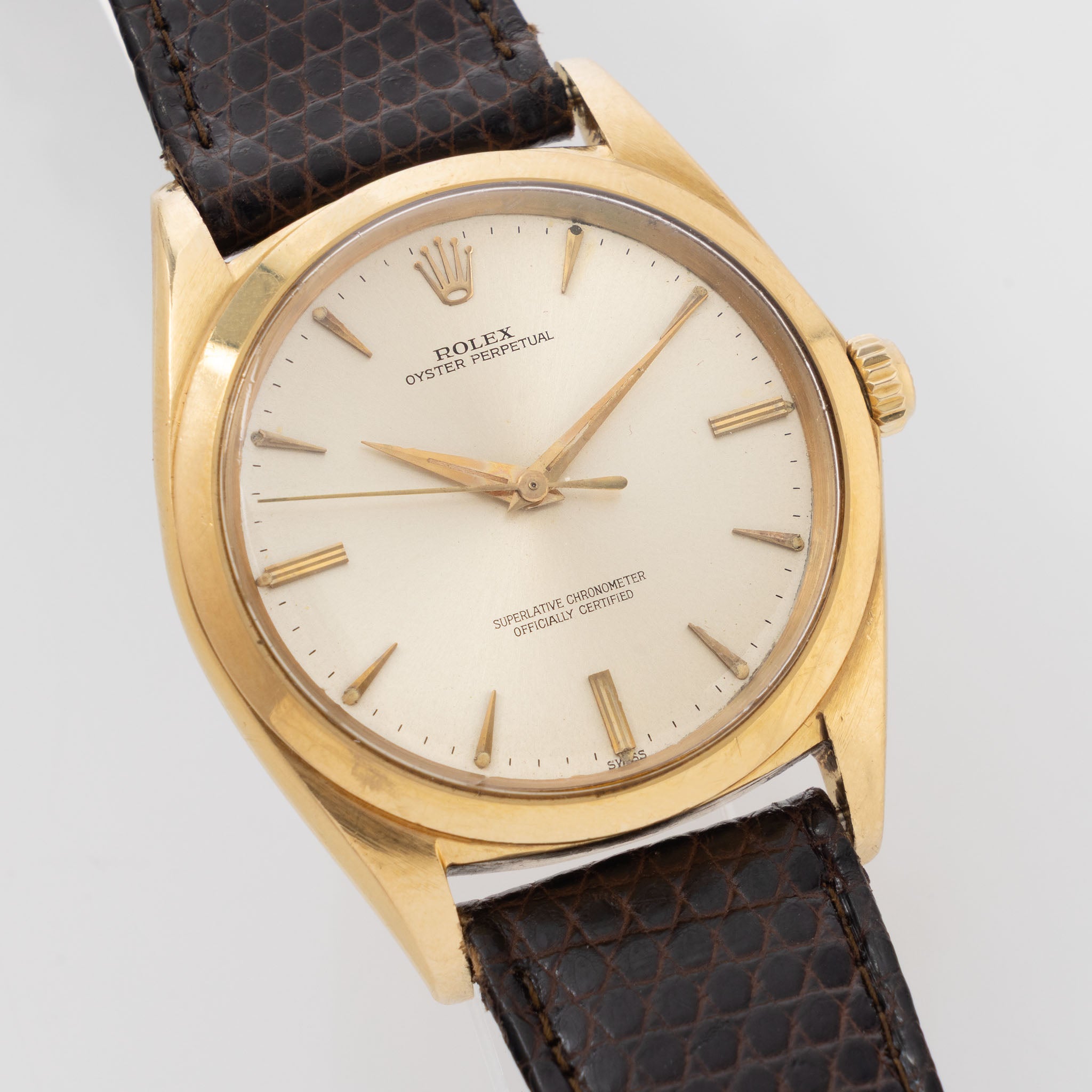 Rolex Oversized Oyster-Perpetual 1012 Silver Swiss Only Dial in 18k Yellow Gold