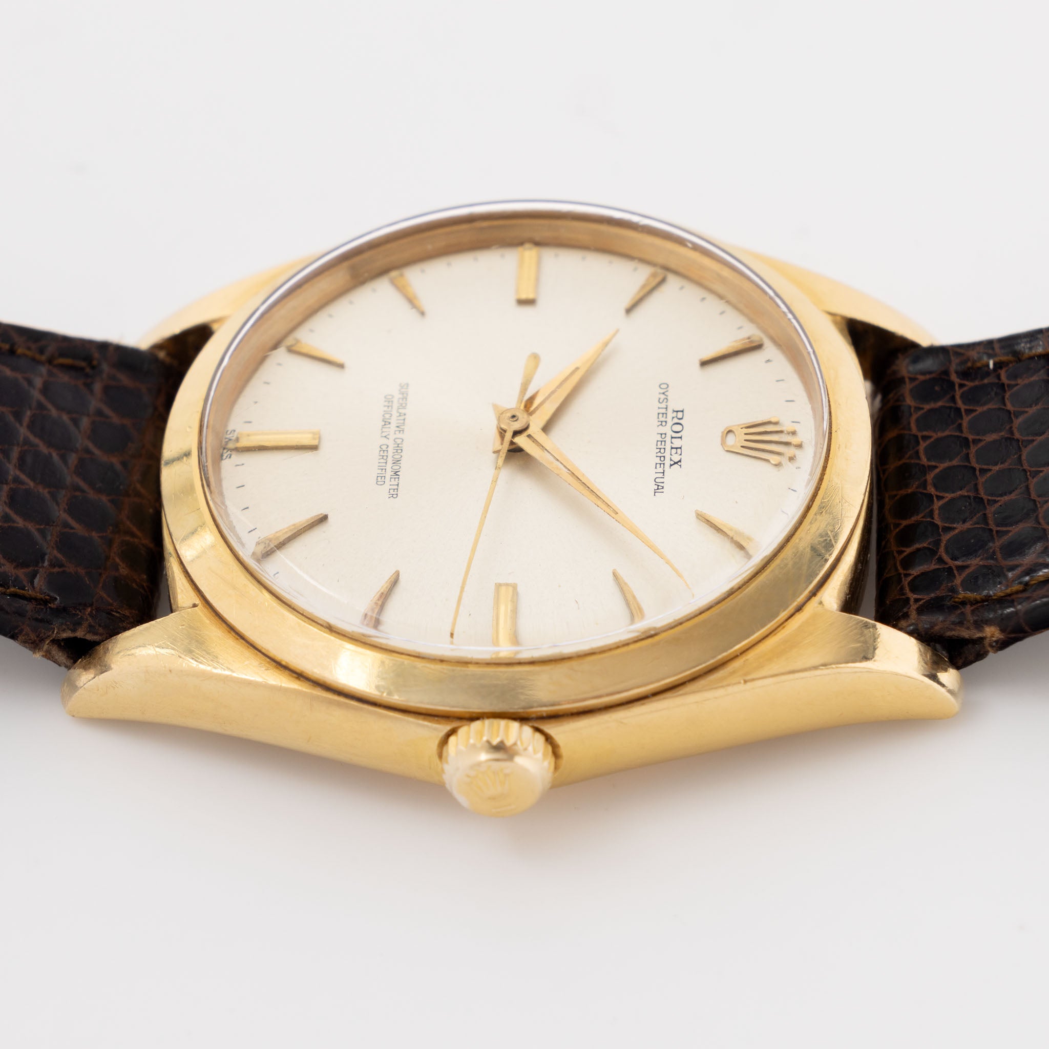 Rolex Oversized Oyster-Perpetual 1012 Silver Swiss Only Dial in 18k Yellow Gold