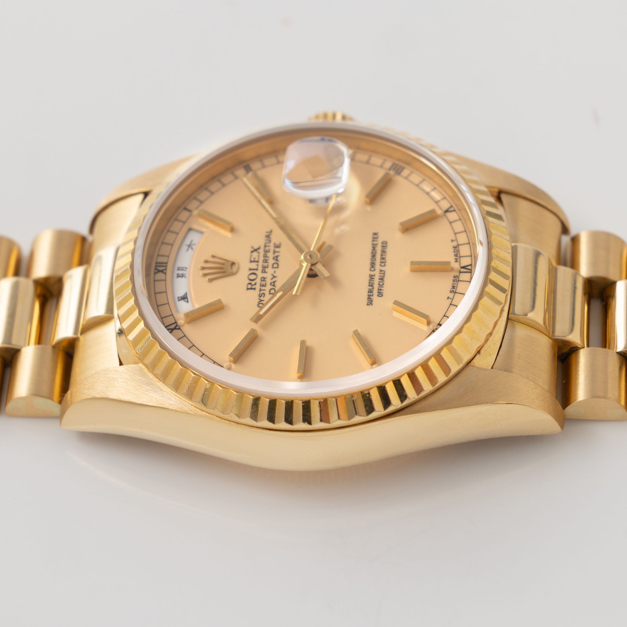 Rolex Day-Date 18238 rare Apricot Stella Dial with Original Guarantee paper in 18k yellow
